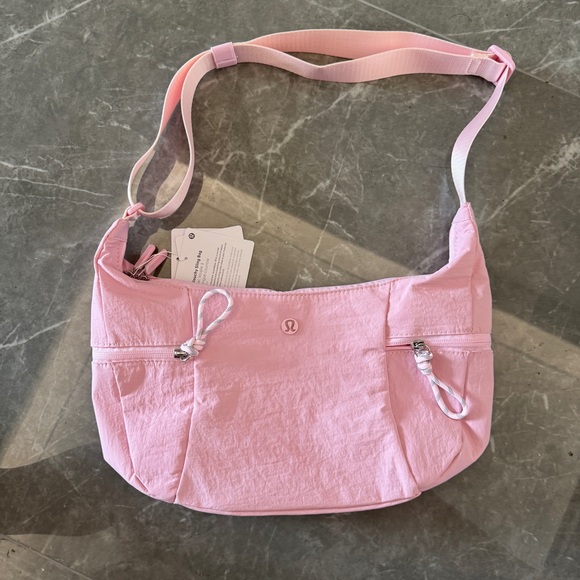 lululemon athletica Handbags - Lululemon Pink Logo 6L Crossbady Bag